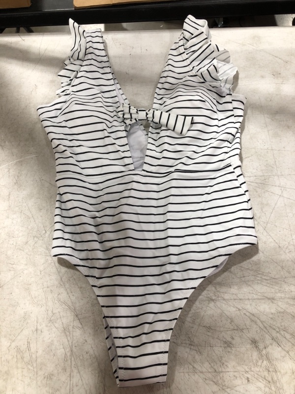 Photo 2 of White And Black Stripe Ruffle One Piece Swimsuit
SIZE XL.