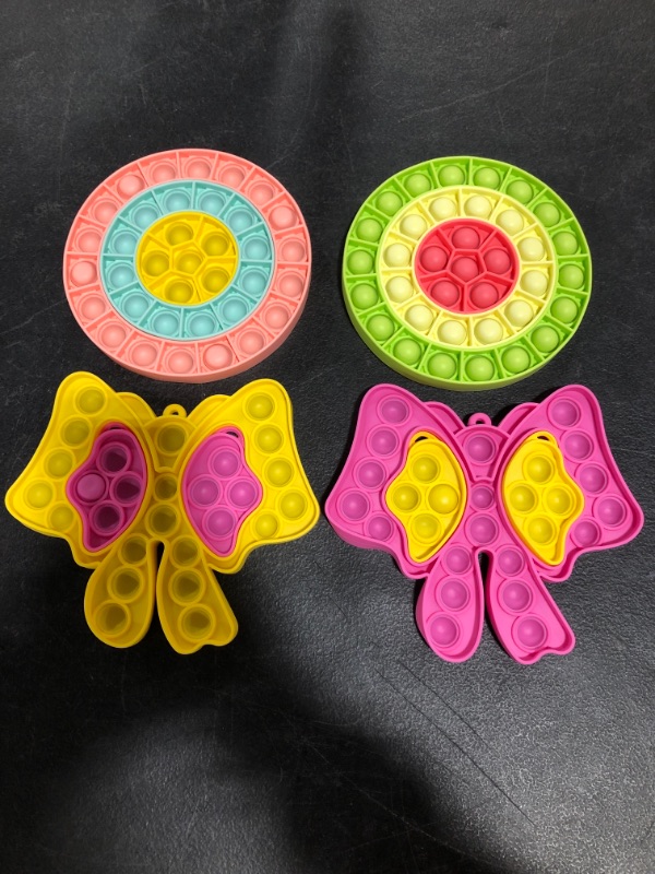 Photo 1 of VARIOUS PUSH POP FIDGET SENSORY TOYS, LOT OF 4.