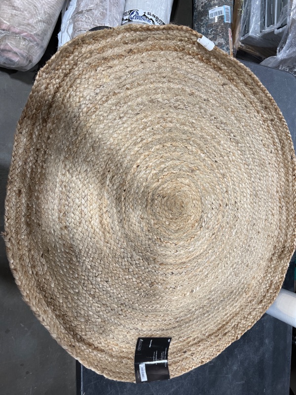 Photo 1 of CHARDIN HOME Jute Braided Boho Round Rug Natural Jute | 3 feet Round Farmhouse Jute Area Rug | Artisnal Bohemian Handcrafted Home Décor
