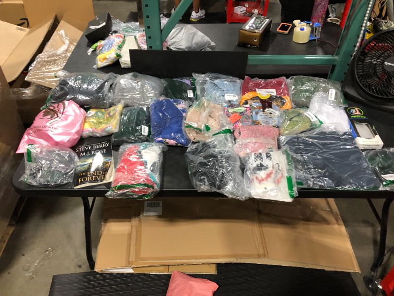 Photo 1 of Amazon Box Lot with various clothing items at an amazing value!!!! 
