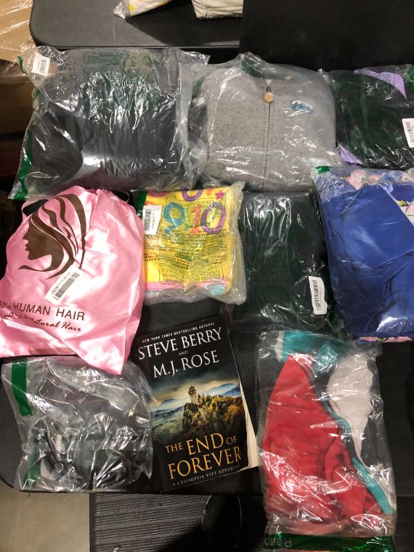 Photo 2 of Amazon Box Lot with various clothing items at an amazing value!!!! 
