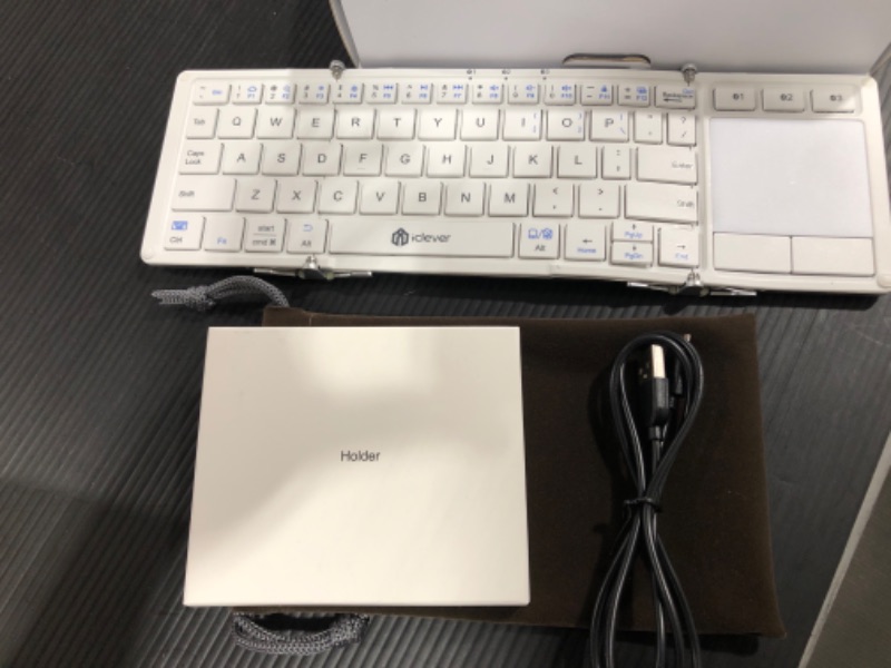 Photo 2 of Foldable Keyboard, iClever BK08 Bluetooth Keyboard with Sensitive Touchpad (Sync Up to 3 Devices), Pocket-Sized Tri-Folded Fodable Keyboard for iPad Mac iPhone Android Windows iOS, White
