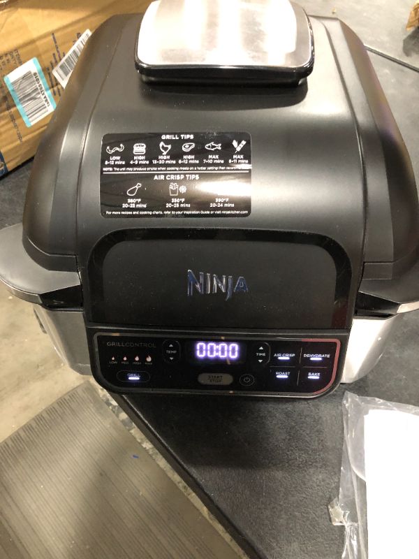 Photo 2 of Ninja Foodi 5-in-1 Indoor Grill with 4-Quart Air Fryer, Roast, Bake, Dehydrate, and Cyclonic Grilling Technology, AG301