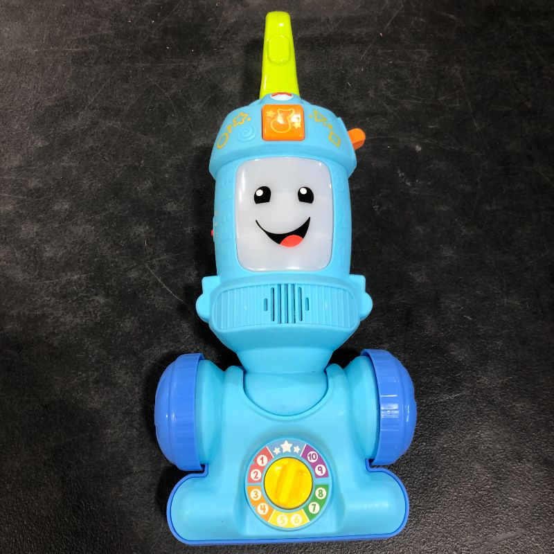 Photo 2 of Fisher-Price Laugh & Learn Light-up Learning Vacuum Musical Push Toy