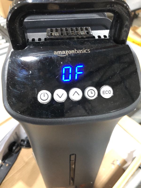 Photo 1 of Amazon Basics Portable Digital Radiator Heater with 7 Wavy Fins and Remote Control, Black, 1500W