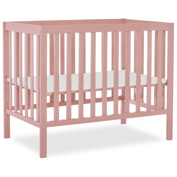 Photo 1 of Dream On Me Edgewood 4 in 1 Convertible Mini Crib in Pink