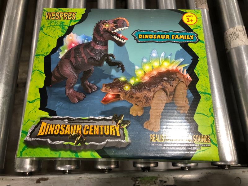 Photo 2 of 2 Pack Electronic Walking Dinosaur Toy with LED Light Up Eyes, Roaring Sound, Realistic Spinosaurus and Stegosaurus, Dinosaur Party Favors, Dinosaur Toy for Kids Boys Girls Ages 3 4 5 6 7 Year Old

