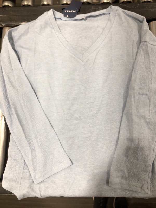 Photo 1 of women's long sleeve light blue shirt large