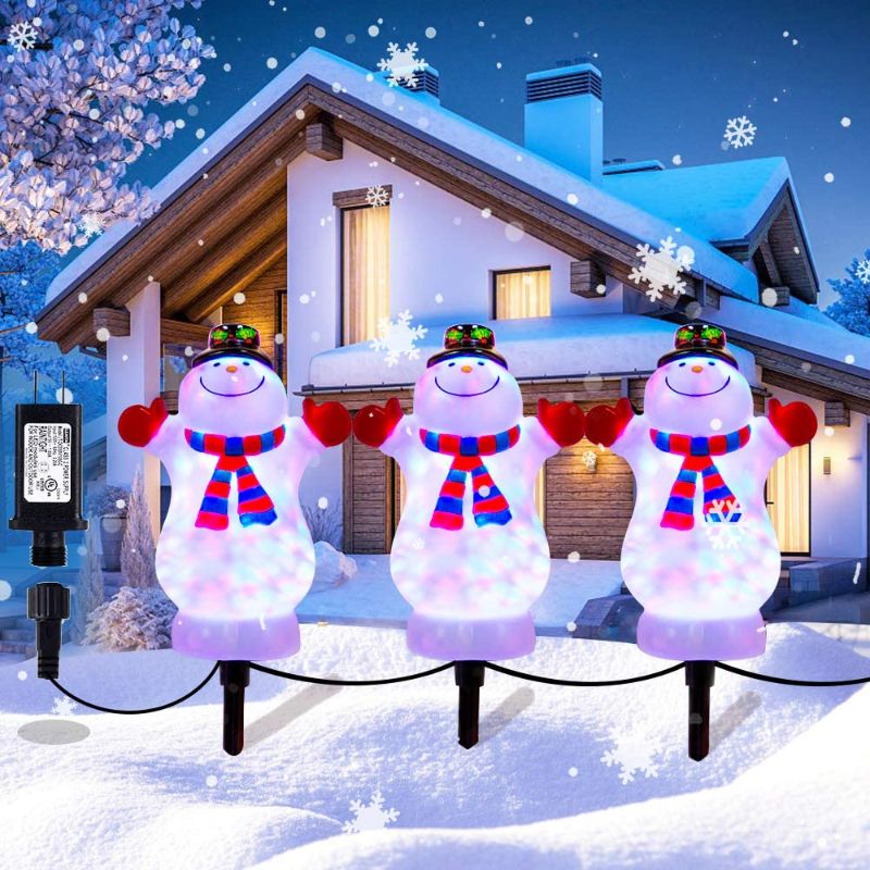 Photo 1 of Christmas Pathway Lights Outdoor Decoration, Snowman Landscape Path Lights, HueLiv 3 PCS LED Snowman Pathway Lights, Waterproof Pathway Stake Lights for Garden, Patio, Yard, Lawn Plug in Lighted Decor
