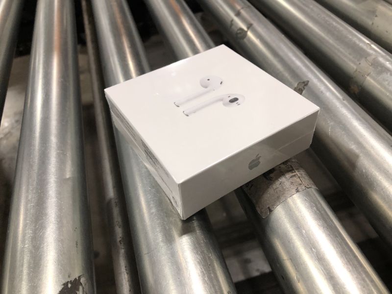 Photo 2 of Apple AirPods with Charging Case (Latest Model)
