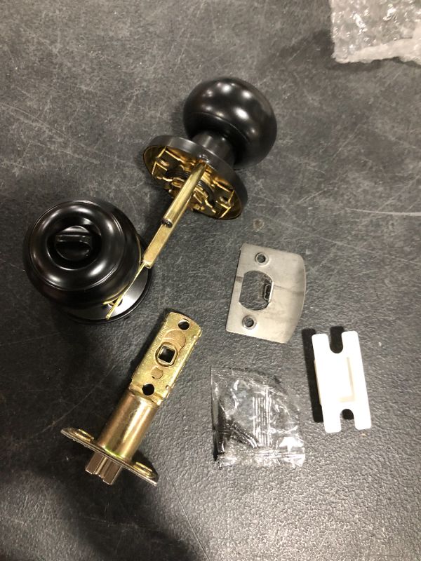 Photo 2 of Black coin unlock door knob with hardware, black 