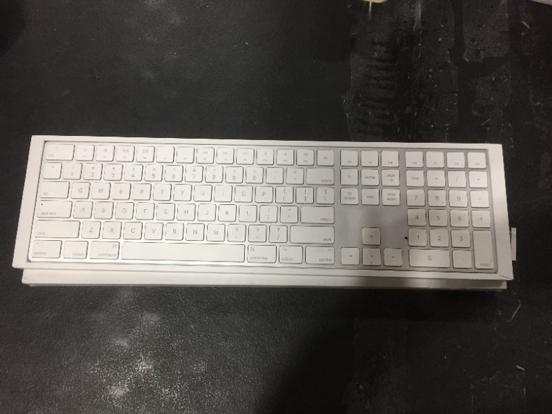 Photo 2 of Apple Magic Keyboard with Numeric Keypad - US English, Includes Lighting to USB Cable, Silver
