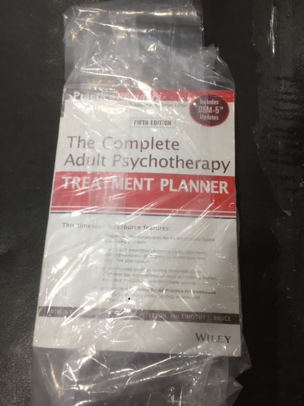 Photo 2 of The Complete Adult Psychotherapy Treatment Planner: Includes DSM-5 Updates Paperback – January 17, 2014
