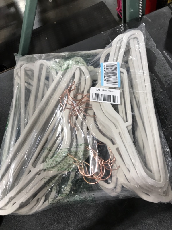Photo 1 of BAGAIL Velvet Hangers,Ivory/Rose Gold Non Slip 360 Degree Swivel Hook Strong and Durable Clothes Hangers for Coats, Suit, Shirt Dress, Pants & Dress Clothes (Ivory/Rose Gold, 50 Pack)
