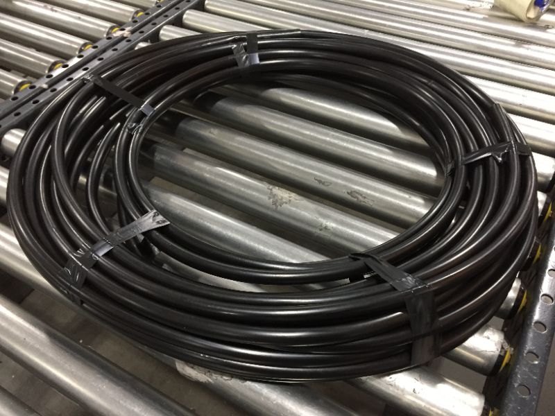 Photo 1 of 1/2 INCH BLACK PLASTIC HOSE, UNKNOWN LENGTH