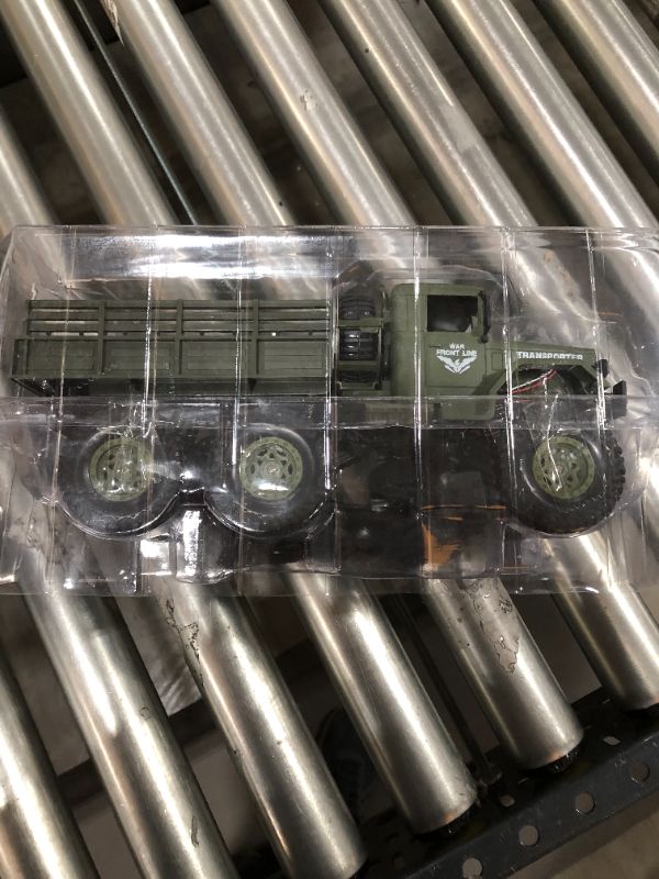 Photo 1 of XINGRUI 50 Minutes Playing Time RC Military Truck, JJRC Q69 Off-Road Remote Control Car 2.4Ghz 4WD 1:18 Scale Toy Vehicle for Kids Children Boy Gift