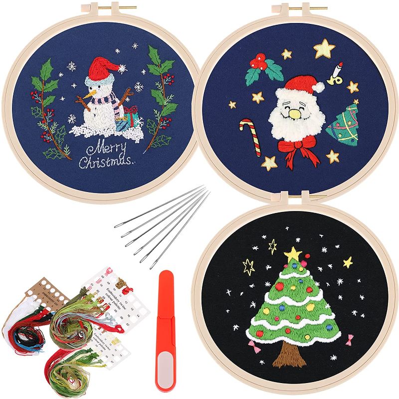 Photo 1 of 3Sets Christmas Embroidery Cross Stitch Starter Kit Christmas Pattern Embroidery Cloth Plastic Embroidery Hoop Color Threads and Tools Kit for Xmas Embroidery Supplies Beginners (3 Patterns) (Style 1)
