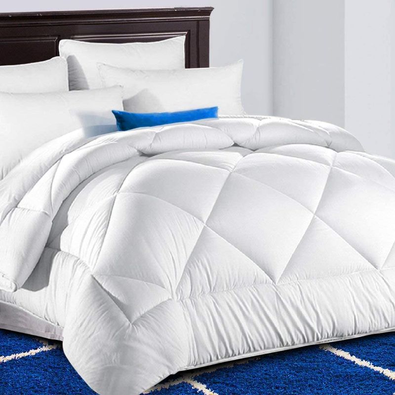 Photo 1 of TEKAMON All Season King Comforter Winter Warm Summer Soft Quilted Down Alternative Duvet Insert Corner Tabs, Machine Washable Luxury Fluffy Reversible Collection for Hotel, Snow White
