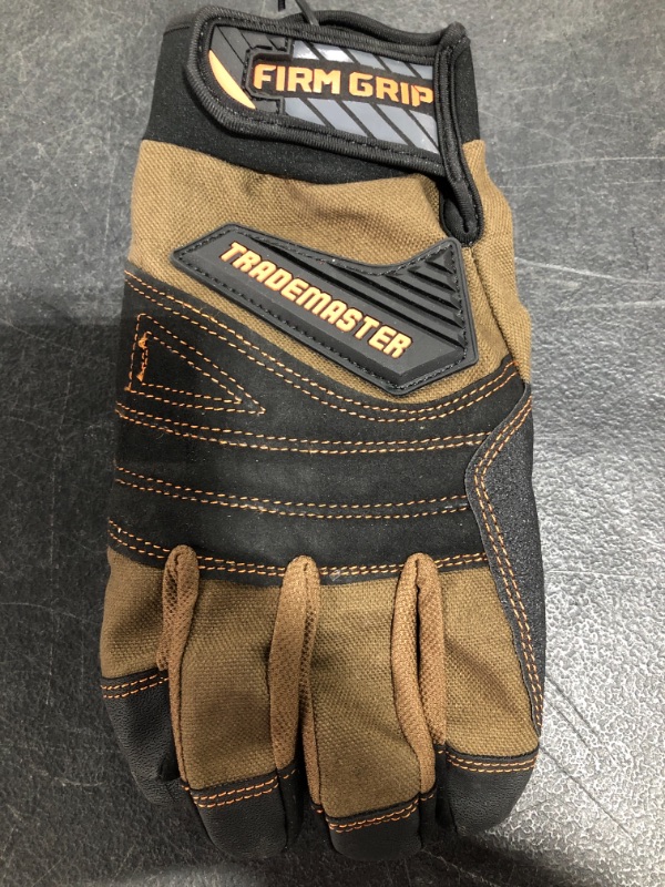 Photo 1 of FIRM GRIP TRADEMASTER GLOVES, BROWN/BLACK, SIZE LARGE.