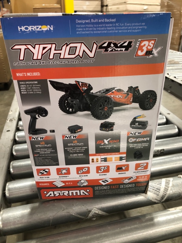 Photo 4 of ARRMA 1/8 Typhon 4X4 V3 3S BLX Brushless Buggy RC Truck RTR (Transmitter and Receiver Included, Batteries and Charger Required), Red, ARA4306V3. PRIOR USE. MISSING CHARGER AND BATTERIES. 
