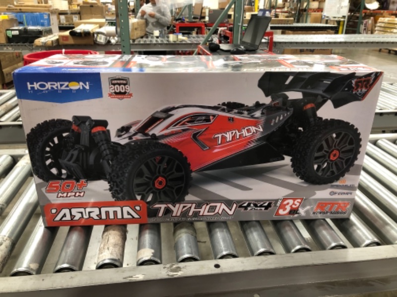 Photo 3 of ARRMA 1/8 Typhon 4X4 V3 3S BLX Brushless Buggy RC Truck RTR (Transmitter and Receiver Included, Batteries and Charger Required), Red, ARA4306V3. PRIOR USE. MISSING CHARGER AND BATTERIES.
