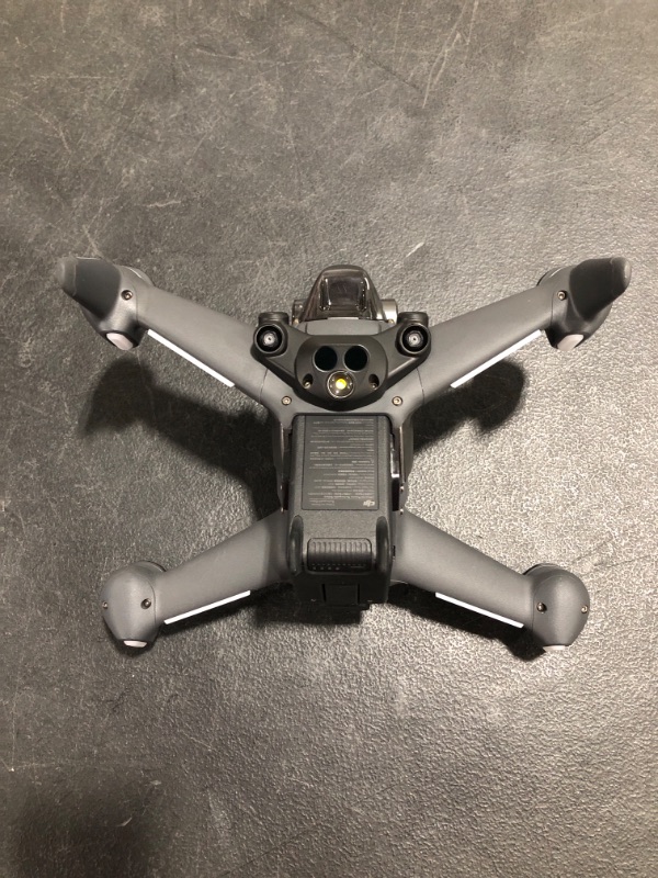 Photo 1 of DJI FPV Combo - First-Person View Drone UAV Quadcopter with 4K Camera, S Flight Mode, Super-Wide 150° FOV, HD Low-Latency Transmission, Emergency Brake and Hover, Gray. PRIOR USE. 
