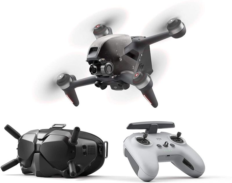 Photo 1 of DJI FPV Combo - First-Person View Drone UAV Quadcopter with 4K Camera, S Flight Mode, Super-Wide 150° FOV, HD Low-Latency Transmission, Emergency Brake and Hover, Gray. PRIOR USE. 
