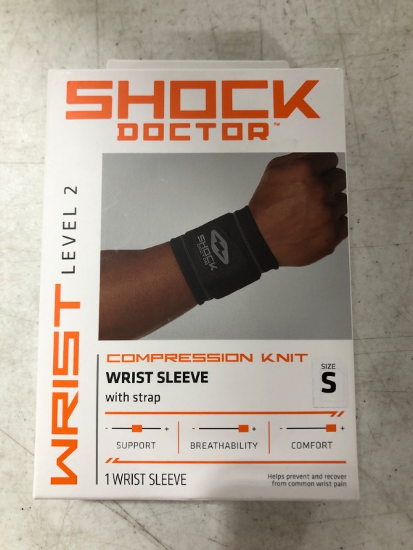 Photo 2 of Shock Doctor Compression Knit Wrist Sleeve with Strap, Black/Grey,Small
