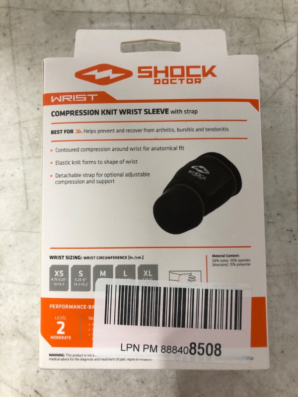 Photo 3 of Shock Doctor Compression Knit Wrist Sleeve with Strap, Black/Grey,Small
