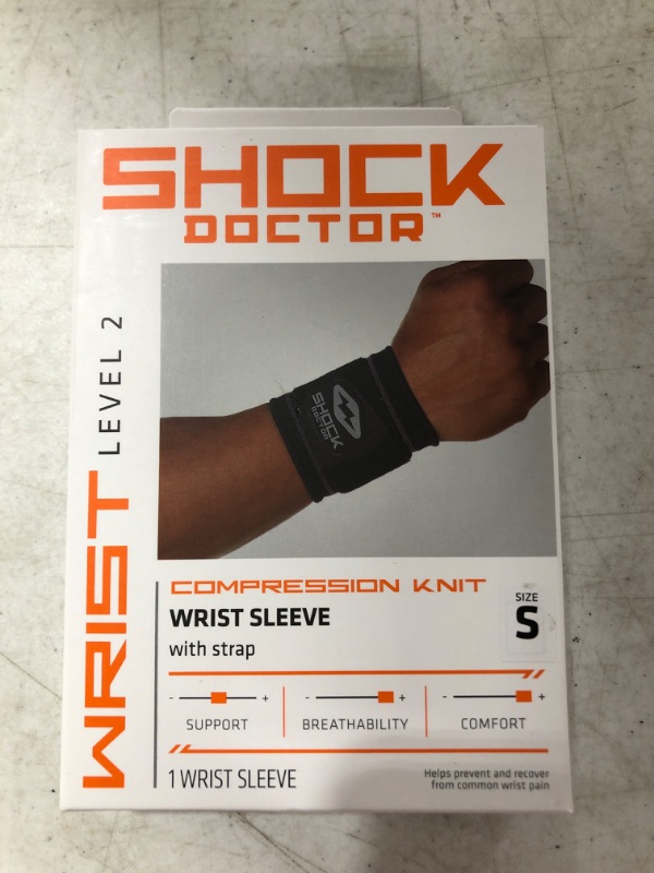 Photo 2 of Shock Doctor Compression Knit Wrist Sleeve with Strap, Black/Grey,Small
