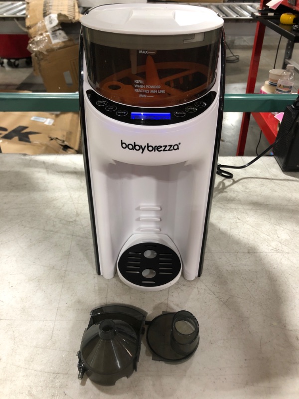 Photo 2 of New and Improved Baby Brezza Formula Pro Advanced Formula Dispenser Machine - Automatically Mix a Warm Formula Bottle Instantly - Easily Make Bottle with Automatic Powder Blending
POWERS ON. PRIOR USE.