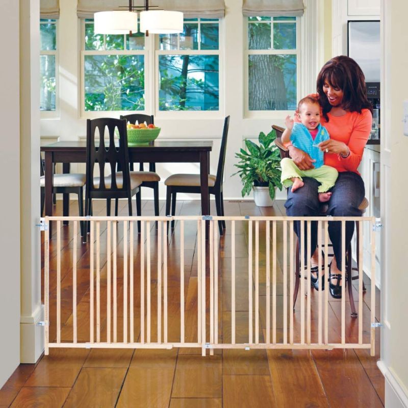 Photo 1 of Toddleroo by North States 103" Wide Extra Wide Swing Baby Gate, Made in USA: Oversized Spaces. No Threshold. One Hand Operation. Hardware Mount. Fits 60"- 103" Wide (27" Tall, Sustainable Hardwood)
