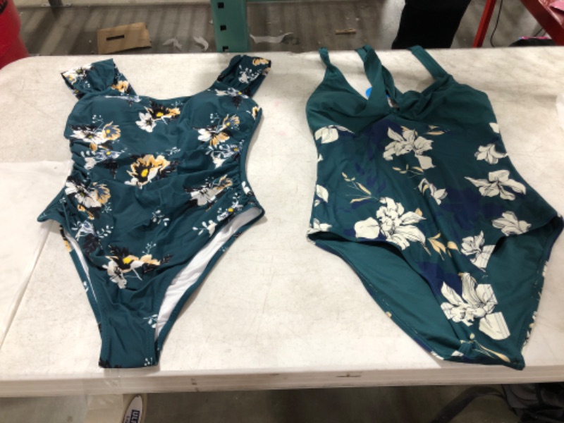 Photo 3 of Charmed Romance Crossover One Piece Swimsuit & Shirred Floral One Piece Swimsuit
LOT OF 2. SIZES LARGE.