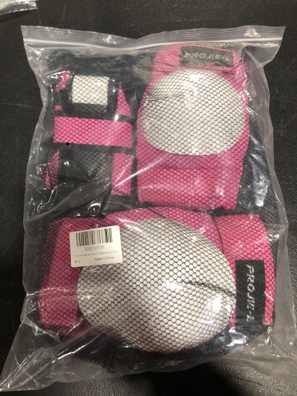 Photo 1 of PROTECTIVE GEAR SAFETY PAD SET FOR KIDS, PINK, SIZE M.