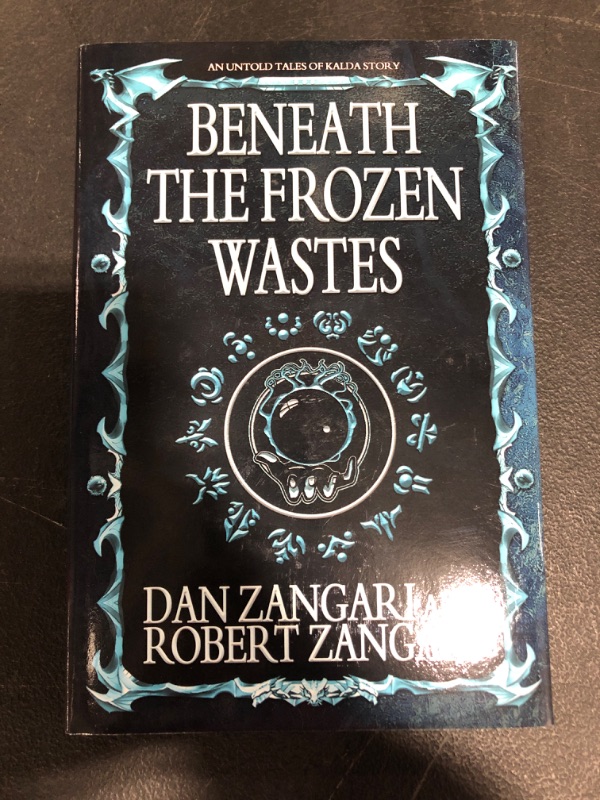 Photo 2 of Beneath the Frozen Wastes Hardcover – April 27, 2021
