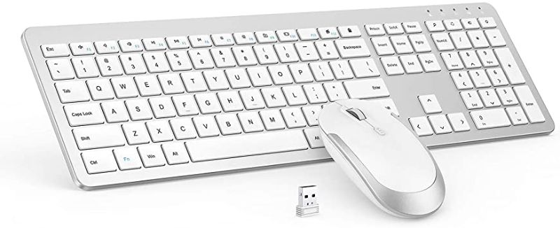 Photo 1 of Wireless Keyboard and Mouse Combo - Full Size Slim Thin Wireless Keyboard Mouse with Numeric Keypad with On/Off Switch on Both Keyboard and Mouse - White & Silver
MAY VARY SLIGHTLY.