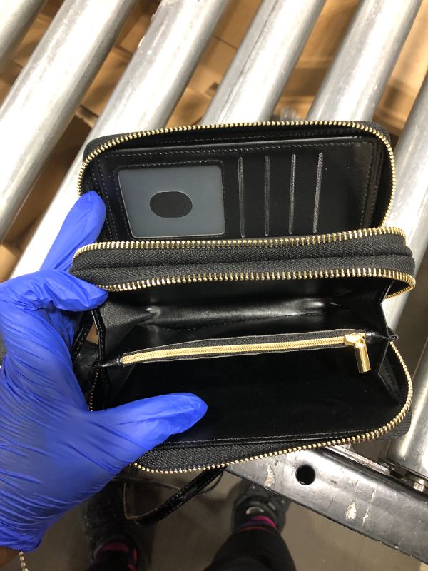 Photo 1 of Black Wallet purse.