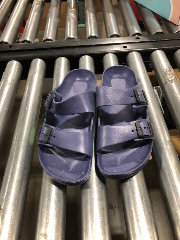 Photo 1 of Blue rubber sandals. 