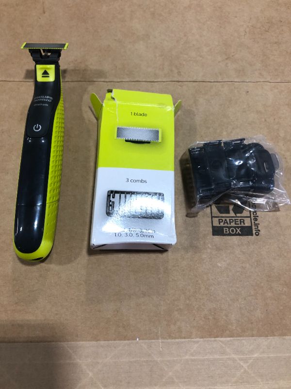 Photo 2 of Philips Norelco OneBlade Hybrid Electric Trimmer and Shaver, Frustration Free Packaging, QP2520/90
