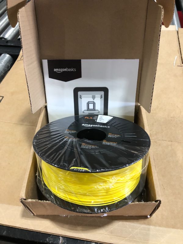 Photo 2 of Amazon Basics PLA 3D Printer Filament, 1.75mm, Yellow, 1 kg Spool
