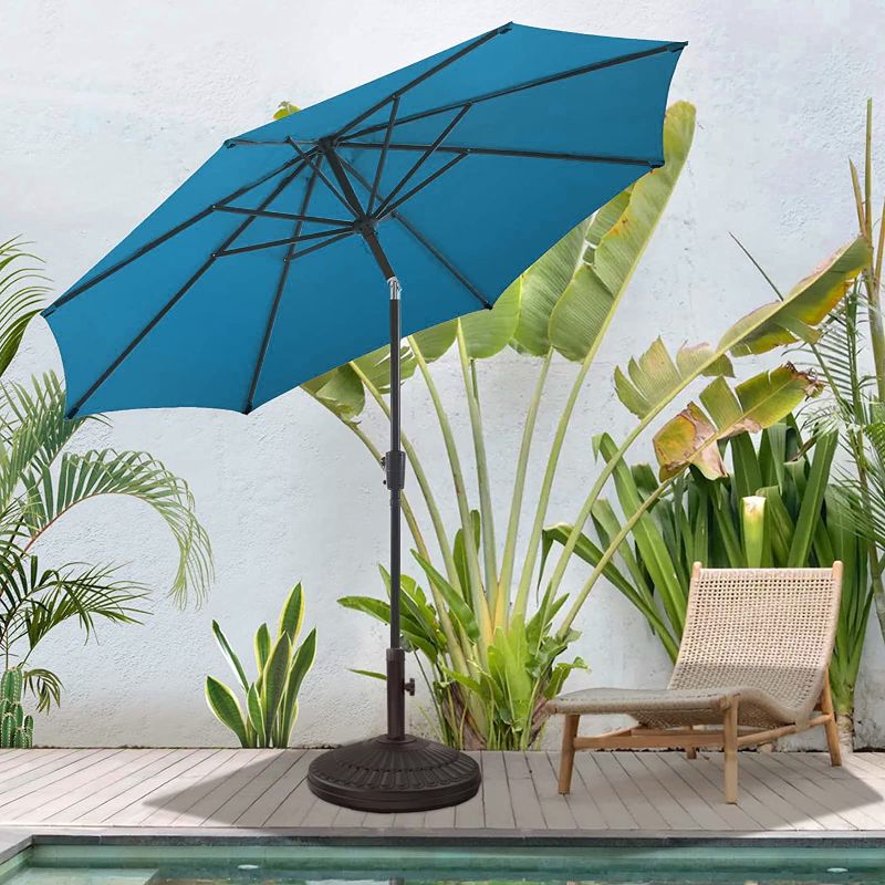 Photo 1 of BLUU MAPLE Olefin 10 FT Patio Umbrella Outdoor Table Umbrellas, 36 Month Fade Resistance Olefin Canopy, Market Center Umbrellas with 8 Sturdy Ribs & Push Button Tilt for Garden, Lawn & Pool
