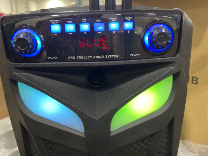 Photo 1 of Portable Bluetooth PA Speaker System - 600W 10” Outdoor BT Speaker - Includes 2 Wireless Microphones, Party Lights, USB SD Card Reader, FM Radio, Rolling Wheels - Remote Control - Pyle PPHP101WMB
