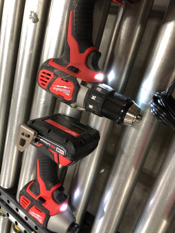 Photo 2 of M18 18-Volt Lithium-Ion Cordless Drill Driver/Impact Driver Combo Kit (2-Tool) W/ Two 1.5Ah Batteries, Charger Tool Bag
