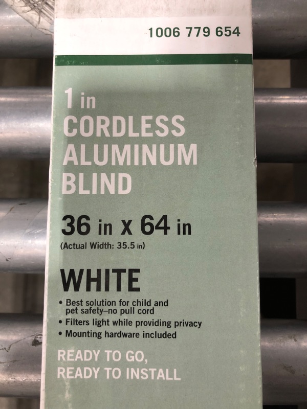 Photo 1 of 1 INCH CORDLESS ALUMINUM BLIND, 36 INCH X 64 INCH. WHITE. 