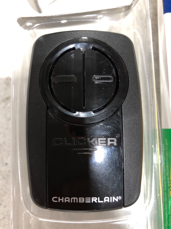 Photo 4 of CHAMBERLAIN Universal Clicker Black Garage Door Remote Control. OPEN BOX. PRIOR USE. 
