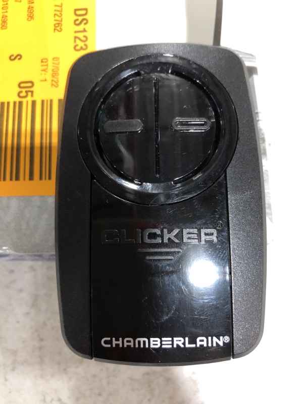 Photo 4 of CHAMBERLAIN Universal Clicker Black Garage Door Remote Control. OPEN BOX. PRIOR USE.
