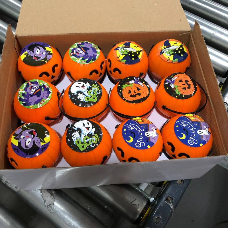 Photo 1 of JOYIN 120 Pcs Halloween Toy Gifts for Kids, 24 Pack Prefilled Mini Pumpkin Buckets with Spider Rings, Poppers, Spring, Vampire Teeth and Spinning Tops for Kids Halloween Party Favors Trick or Treat
