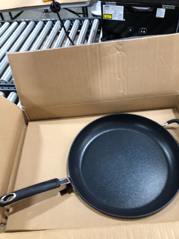 Photo 1 of Black Steel Wok Pan 