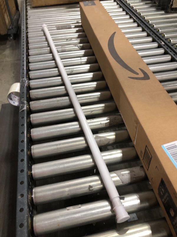 Photo 1 of 4ft tension rod --- white