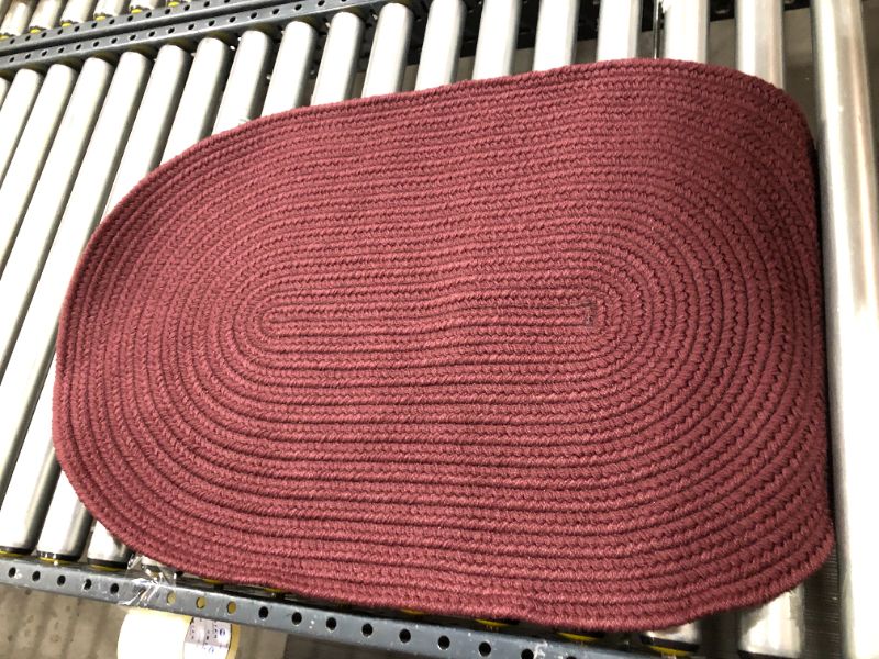 Photo 1 of 23in x 36in oval rug--- maroon 